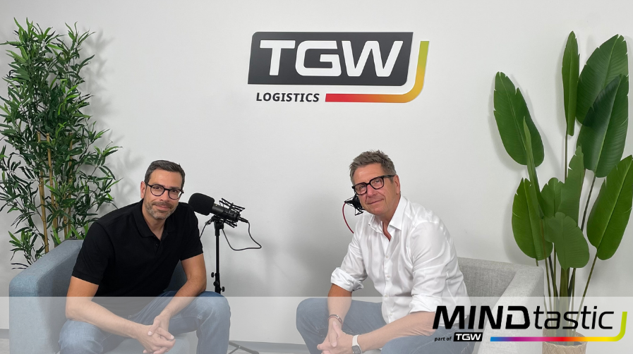 two TGW Logistics employees discuss how the organization handles data